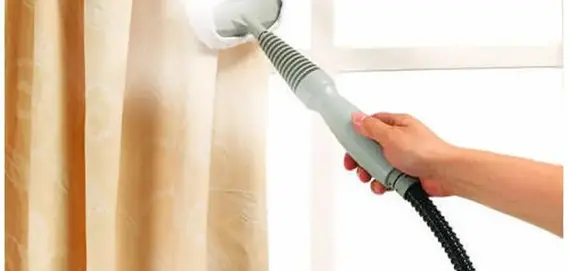 A hand using a handheld